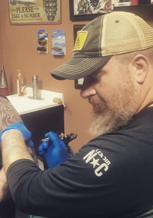 Scott Sheene tattooing